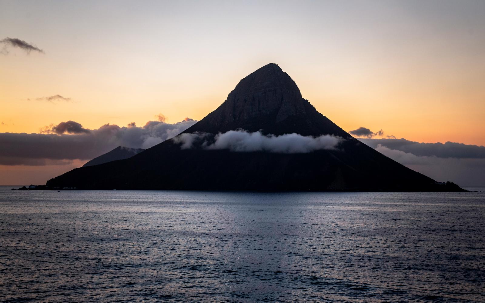 Mount Pico rising above the clouds seen across the ocean